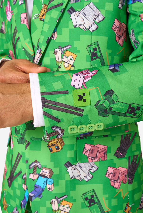 Detailed sleeve close-up of Minecraft-themed blazer, highlighting vibrant characters and green buttons.