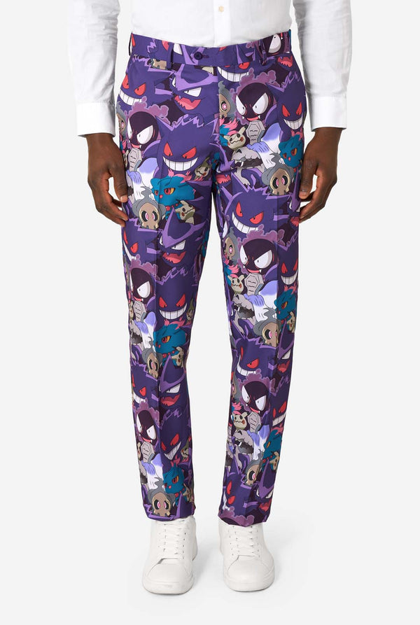 A man wearing a Ghost Pokemon themed suit with a Ghost Pokemon themed tie and a white shirt on a white background. Close up of the pants