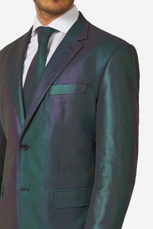 A man wearing a reflective suit, with a reflective tie and a white shirt on a white background. Close up of the chest