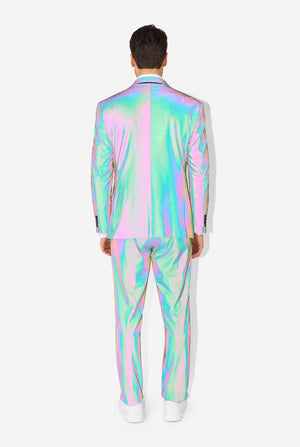 A man wearing a reflective suit, with a reflective tie and a white shirt on a white background. Photo taking with flash on, view from the back