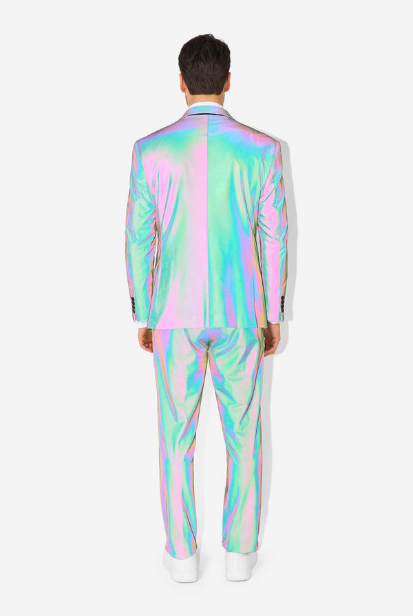 A man wearing a reflective suit, with a reflective tie and a white shirt on a white background. Photo taking with flash on, view from the back