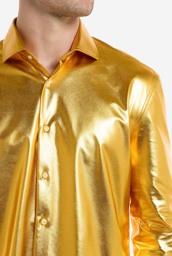 Gold metallic shirt worn by a person on a white background