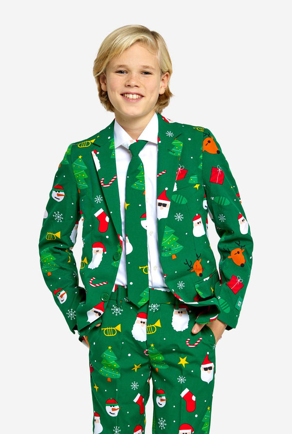 Teen wearing green Christmas suit for teens, with Christmas icons.