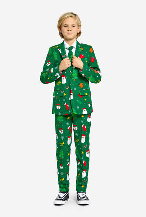 Teen wearing green Christmas suit for teens, with Christmas icons.