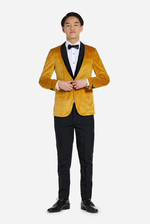 Teen wearing golden velvet dinner jacket
