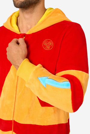 Aang onesie detail shot with Air Nomad symbol on chest and blue arrow on sleeve.