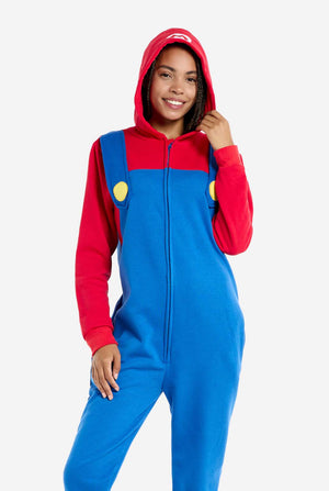 Woman wearing unisex adult onesie with Super Mario print