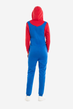 Woman wearing unisex adult onesie with Super Mario print