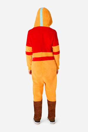 Child wearing a red and orange Aang onesie with a hood on a white background. View from the back