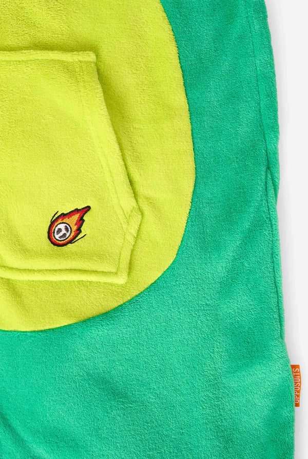 A kid is wearing a green dinosaur kids onesie featuring playful hood details and cozy, soft material, perfect for lounging or costume events. Kangeroo pocket close up.