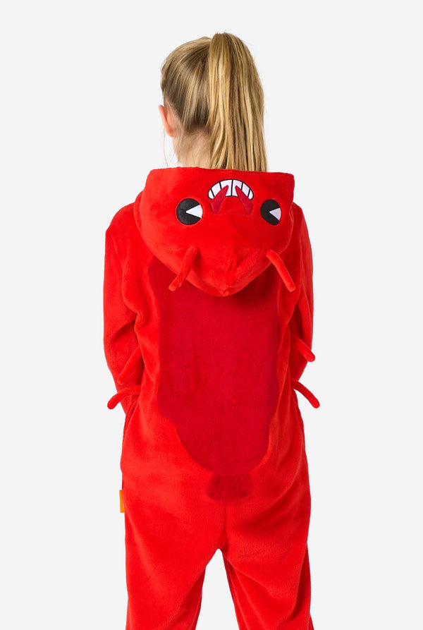 A kid is wearing a bright red lobster-themed kids onesie featuring playful hood details and cozy, soft material. View from the back, with the hood down.