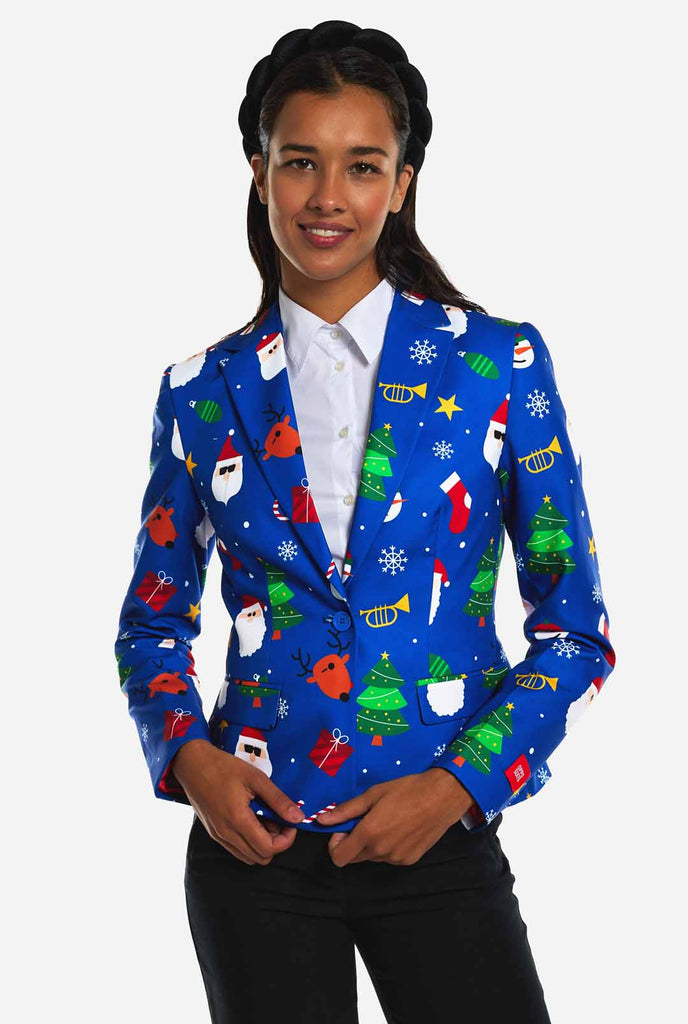 Woman wearing blue Christmas blazer for women, with Christmas icons on it.