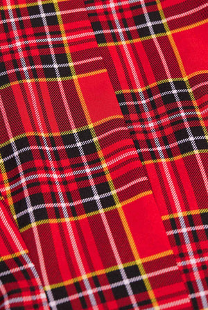 Woman wears womens blazer with tartan print 