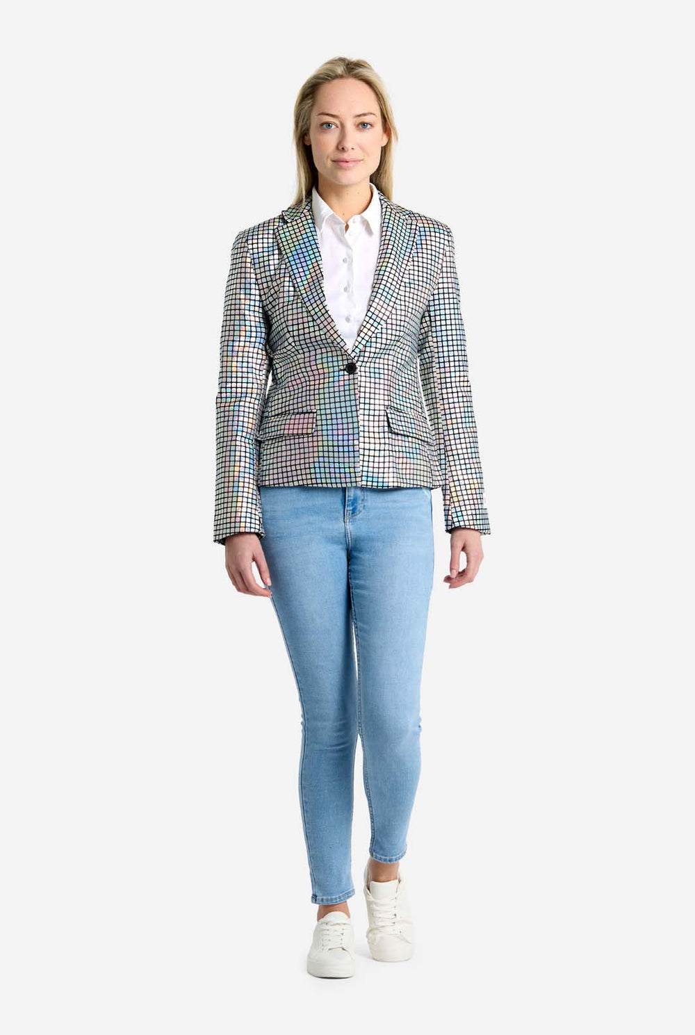 Woman wearing a checkered discoball blazer over a white shirt with a plain background