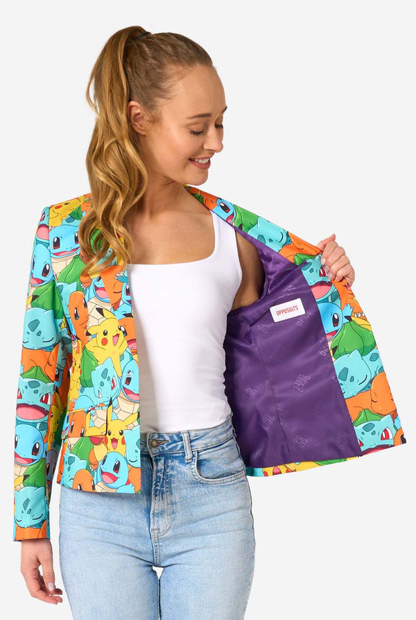 Women wearing a multi colored pokemon blazer, featuring characters such as pikachu, squirtle, charmander and bulbasaur. Holding one side of the blazer open.