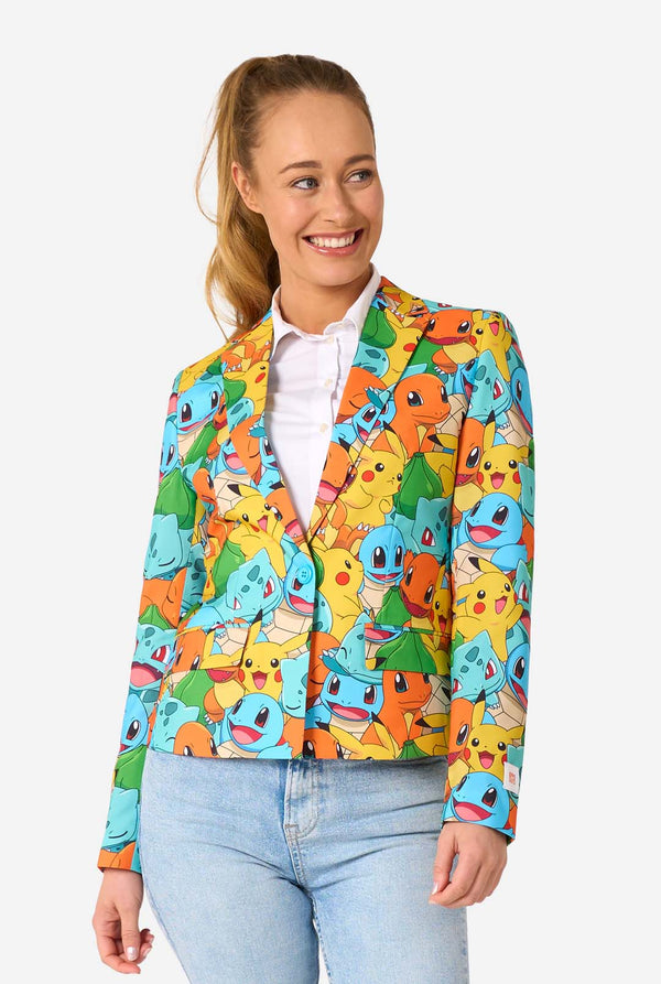 Women wearing a multi colored pokemon blazer, featuring characters such as pikachu, squirtle, charmander and bulbasaur. Looking to the side