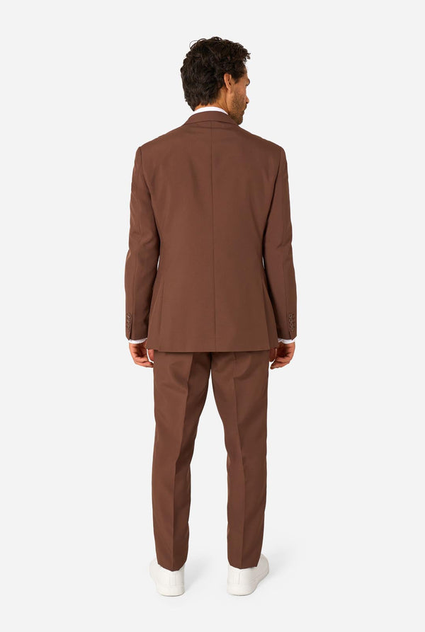Man wearing a brown suit on a white background