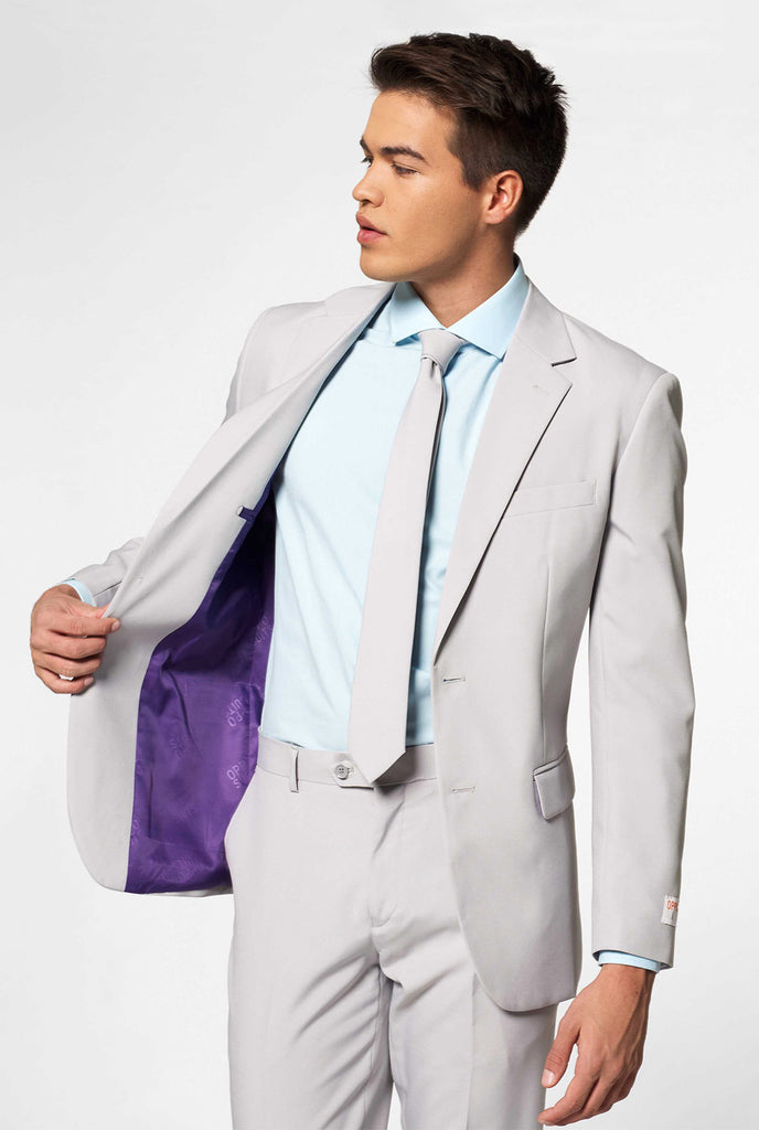 Solid color light grey men's suit Groovy Grey worn by men inside pocket