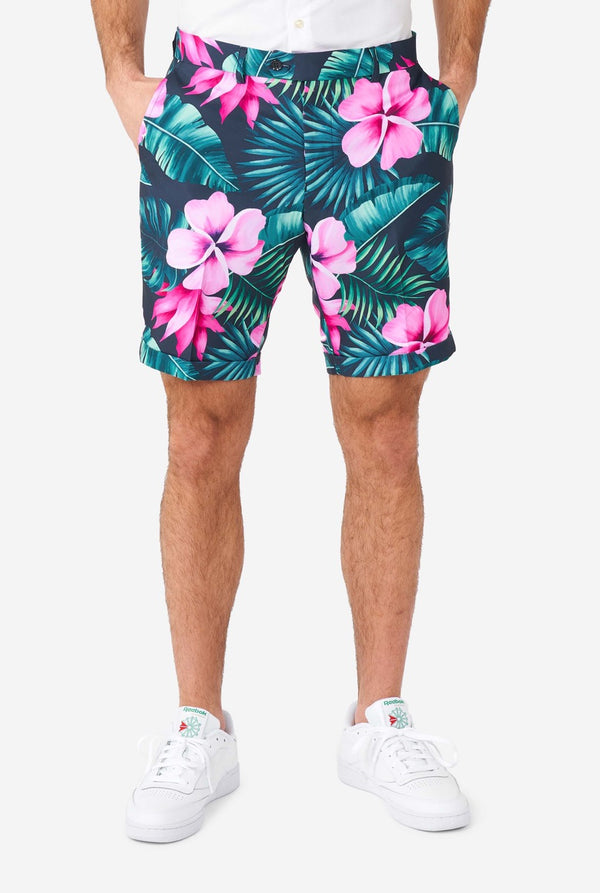 Man wearing blue summer suit with pink flowers in Hawaiian print