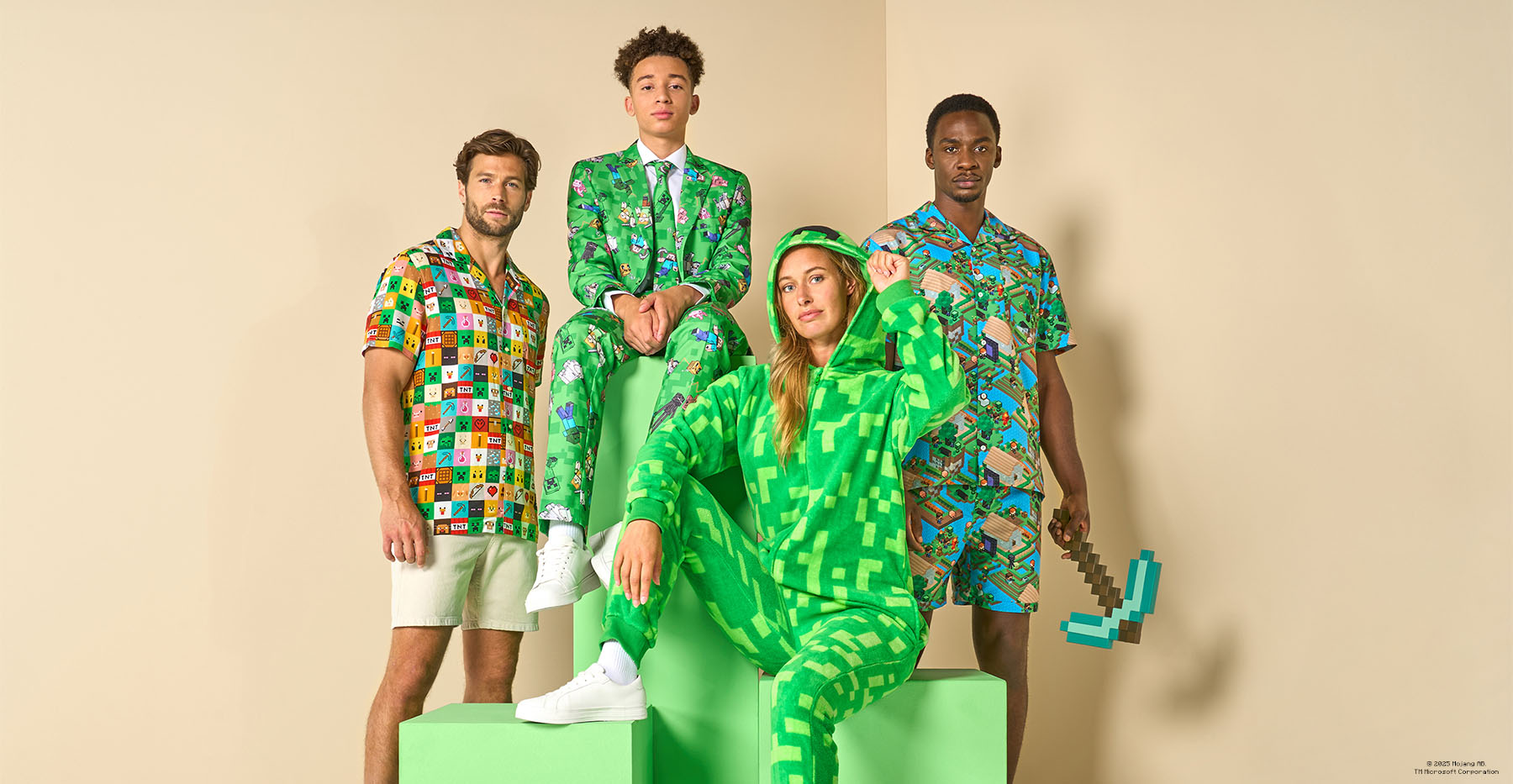 Four people wearing colorful Minecraft-themed outfits, including pixelated patterns and characters from the game, posing on green blocks with one person holding a Minecraft pickaxe prop.