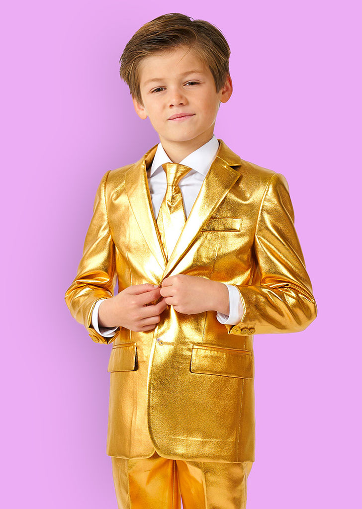 A boy wearing a golden suit