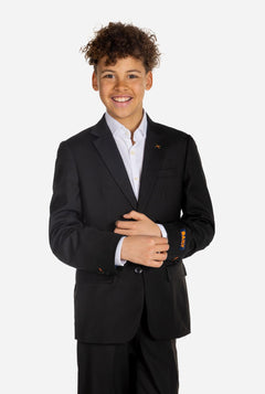 Teen wearing OppoSuits Daily Black teen boys suit
